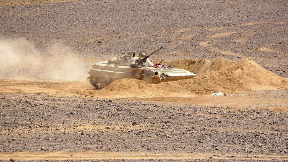 Arab coalition forces get into position during clashes with the Iran-backed Houthi militia in Al-Jadaan area about 50 kilometers northwest of Marib in central Yemen on Feb. 11, 2021. (AFP) Arab coalition forces get into position during clashes with the Iran-backed Houthi militia in Al-Jadaan area about 50 kilometers northwest of Marib in central Yemen on Feb. 11, 2021. (AFP)