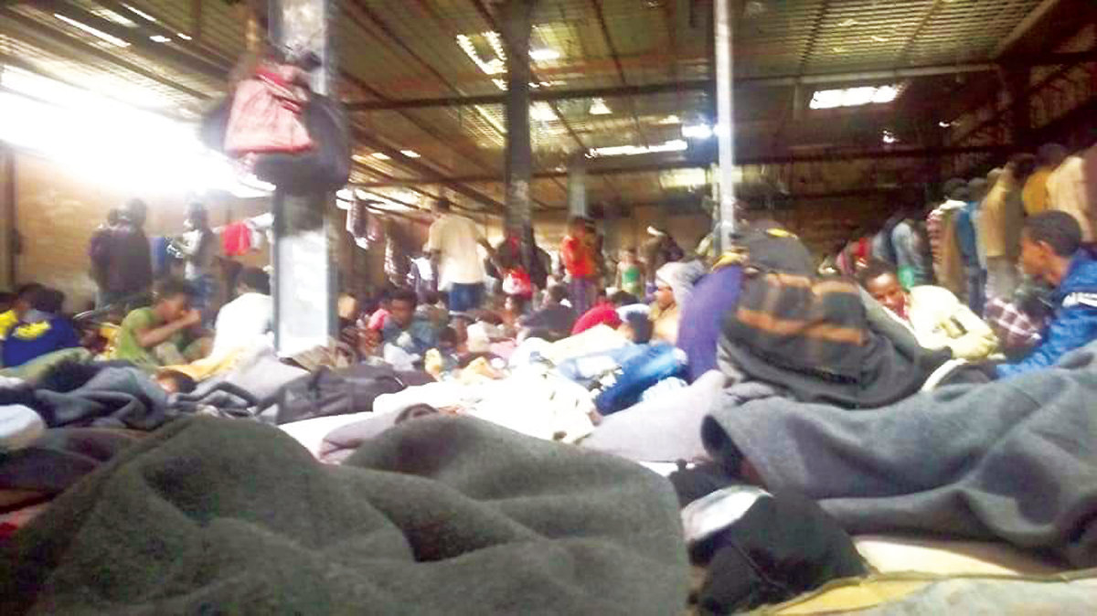 Conditions in the hangar before the fire were bad enough. (Oromia Human Rights Organization photo) Conditions in the hangar before the fire were bad enough. (Oromia Human Rights Organization photo)