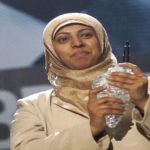 Nadia al-Sakkaf, then editor-in-chief of The Yemen Times, is presented with the first Gebran Tueini award at the Press Under Siege conference, Beirut, Lebanon, Dec. 10, 2006. (Joseph Barrak/AFP via Getty Images)