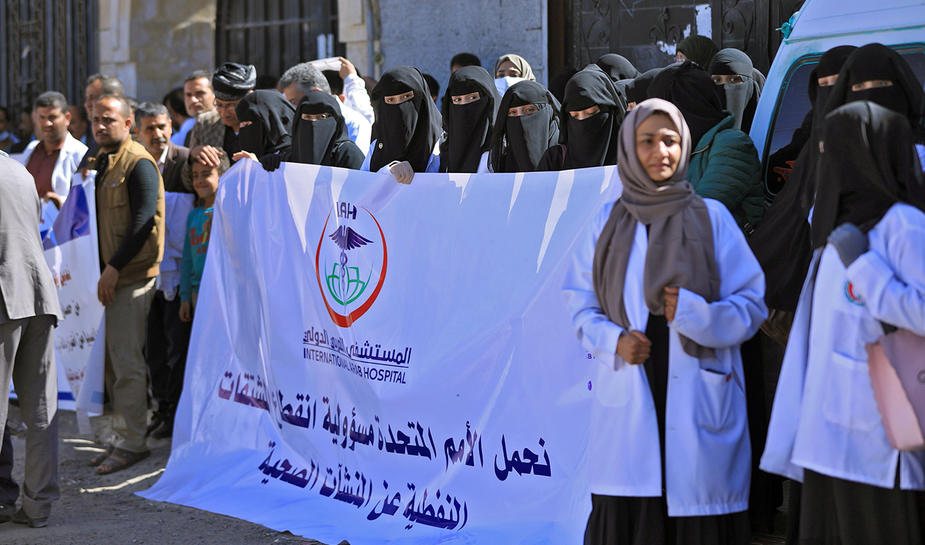 Yemeni doctors and nurses in Houthi-occupied Sanaa, on Tuesday, protest outside the UN office against fuel shortages leading to a decline in helathcare services. (AFP)